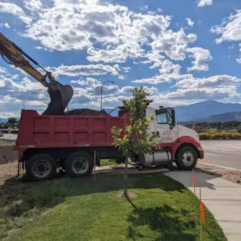 Construction dump truck loading soil