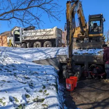 Winter roadwork snow machinery laborers