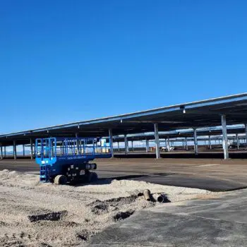 Construction site with blue scaffolding