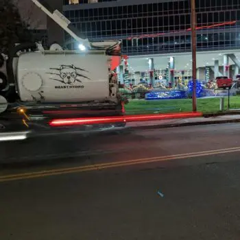 Vacuum truck in city night