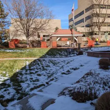 Outdoor courtyard with light snow