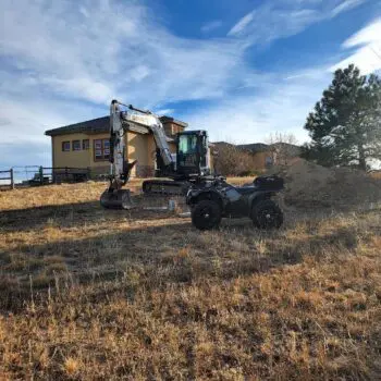 Residential construction with excavator equipment