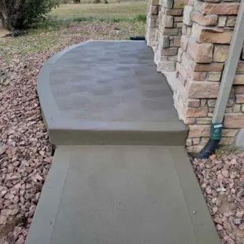 Stained concrete walkway leading edge