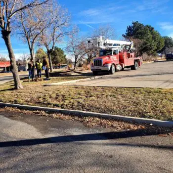 Utility workers with red truck