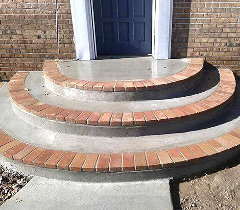 Concrete brick steps entranceway construction