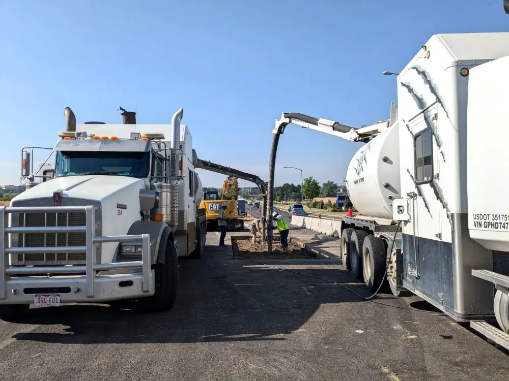 Road construction vacuum truck operation