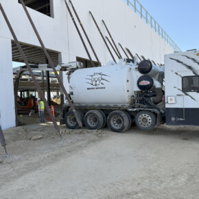 Construction vacuum truck at site